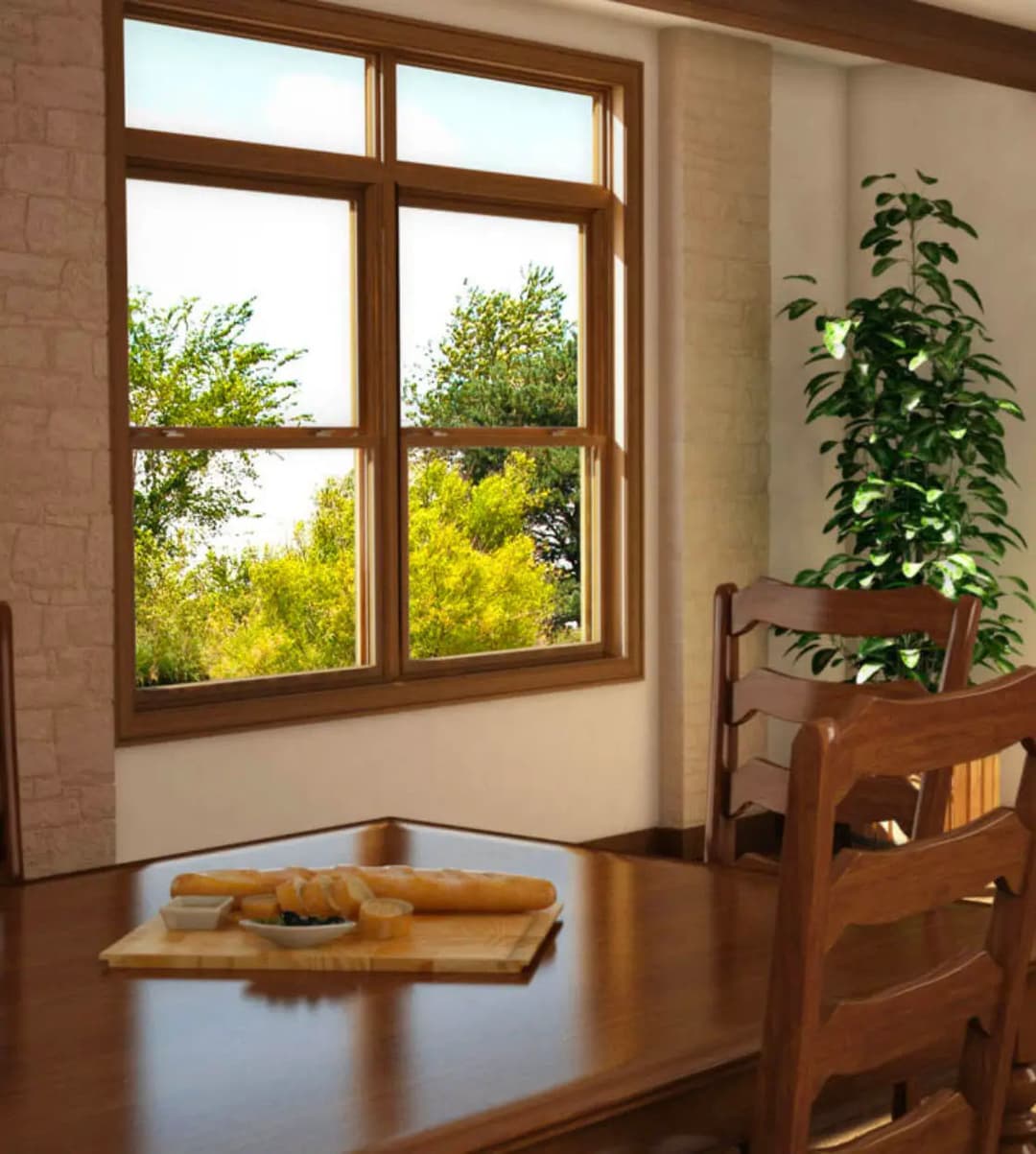 Cozy dining area with wooden table, fresh bread, and sunlight streaming through a window.